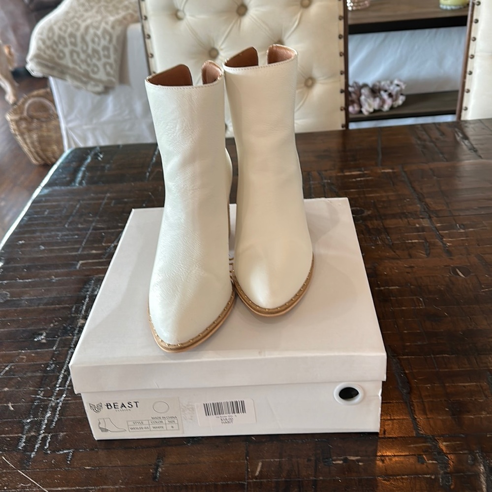 Adorable Beast white booties. Like new! Size 8